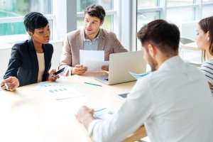 Businesspeople working together on business meeting in conference room