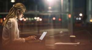 Businesswoman working overtime in office