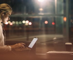 Businesswoman working overtime in office